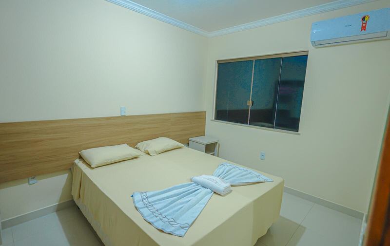 Quarto com ar-condicionado